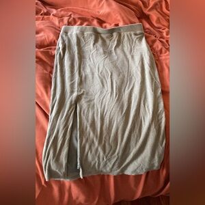 Altered state size, medium double lined body con skirt with a side slit